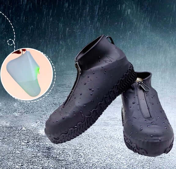 Waterproof silicone zippered shoe covers in black, designed to keep shoes dry and clean in wet conditions.