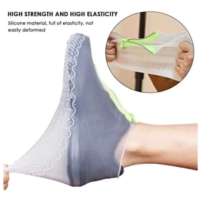 High elasticity waterproof silicone zippered shoe covers stretching over a foot, showcasing their flexibility and strength.